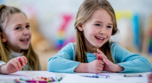kids using small crayons to improve pencil grasp